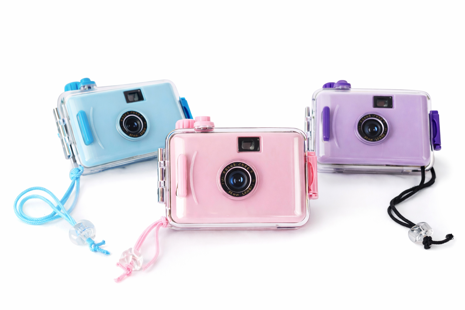 Three colorful disposable cameras with lanyards on a white background